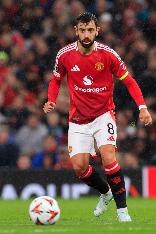 soccer player wearing a red shirt with snapdragon on it