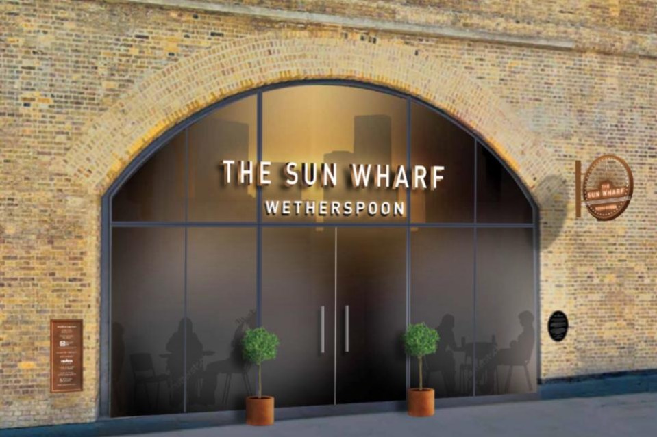 the sun wharf wetherspoon is located in a brick building