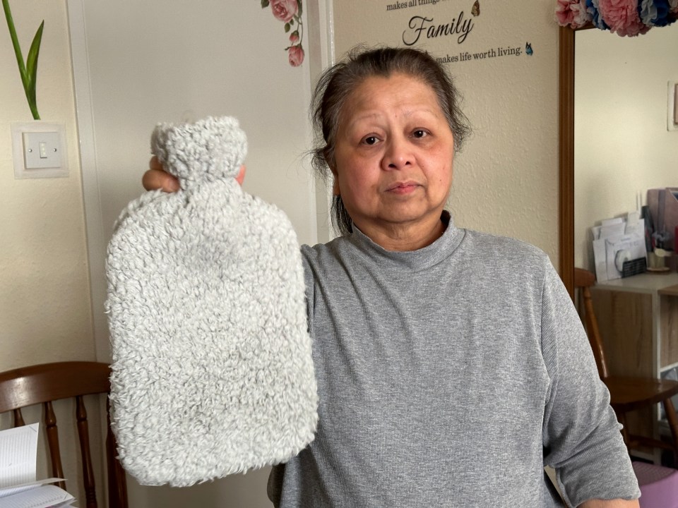 Retired nurse Eleme Te with her hot water bottle