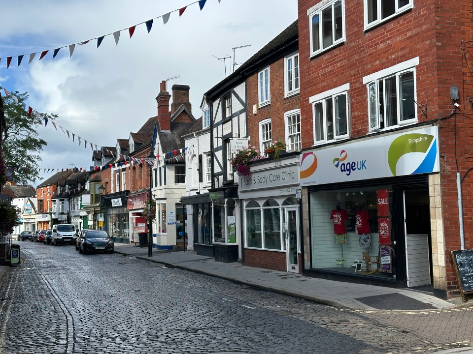 a store front with ageuk written on it