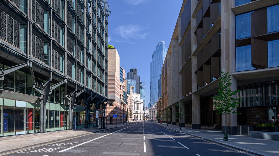 an empty street with a bus lane in the middle