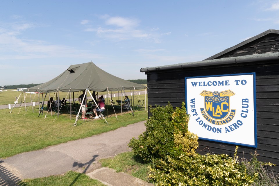 a sign that says welcome to west london aero club