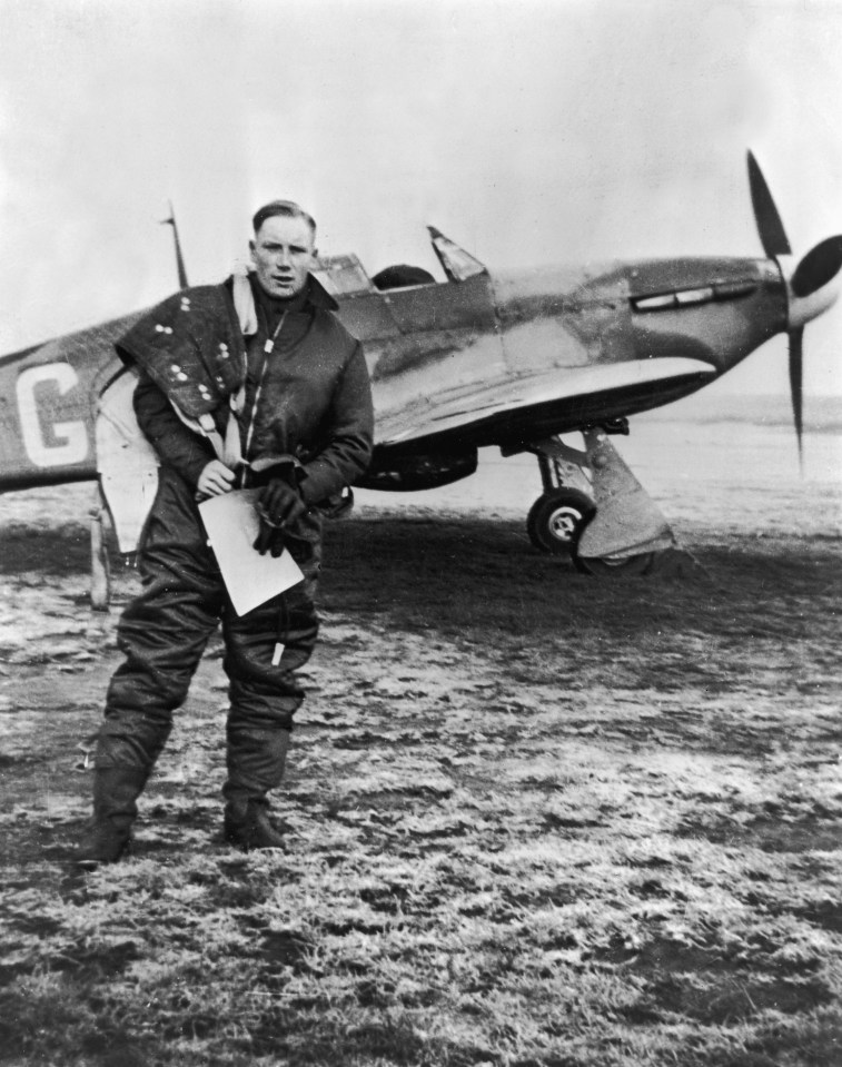 British Royal Airforce (RAF) pilot Douglas Horne walks away from his Hawker Hurricane aeroplane after flying in the Battle of Britain