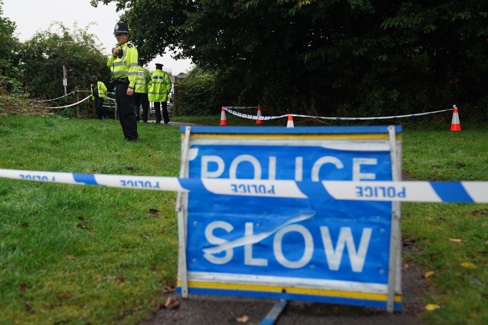 a blue sign that says police slow on it