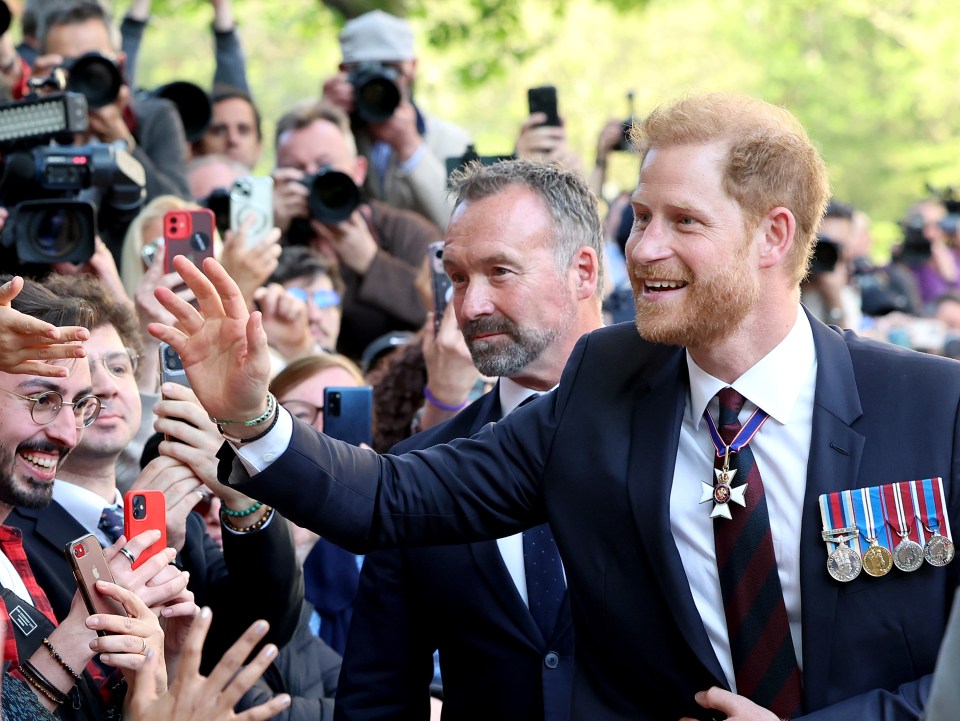 Prince Harry meets members of the public as he departs The Invictus Games Foundation 10th Anniversary Service at St Paul’s Cathedral on May 8