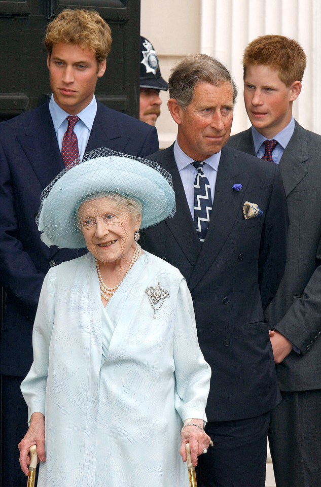 a man in a suit and tie stands next to a woman in a blue hat