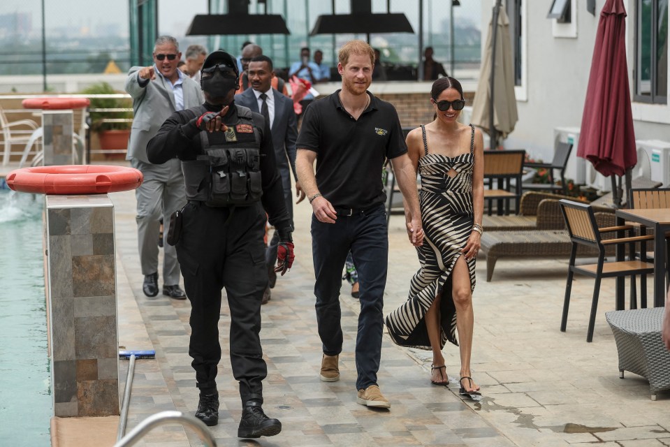 Prince Harry and Meghan arrive for an exhibition sitting volleyball match at Nigeria Unconquered in Abuja on May 11, 2024