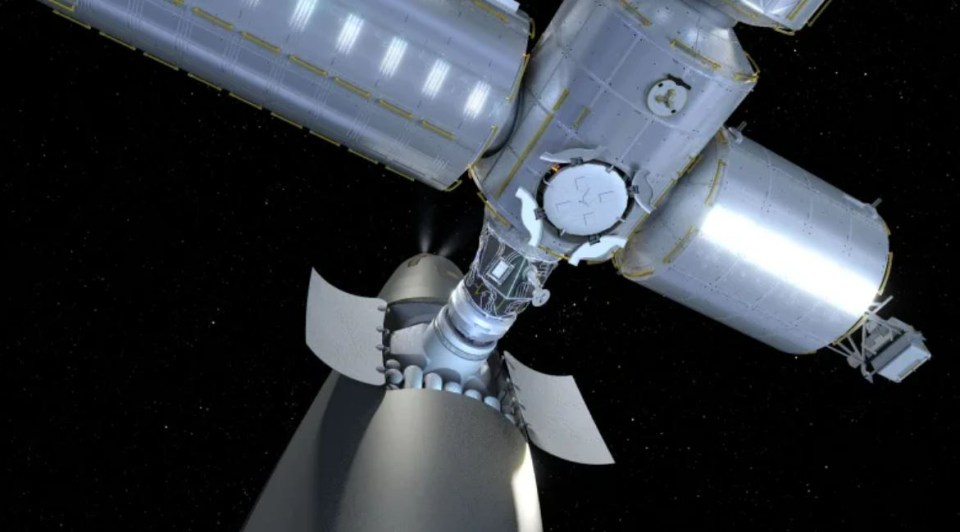 an artist 's impression of a space station with a rocket attached to it