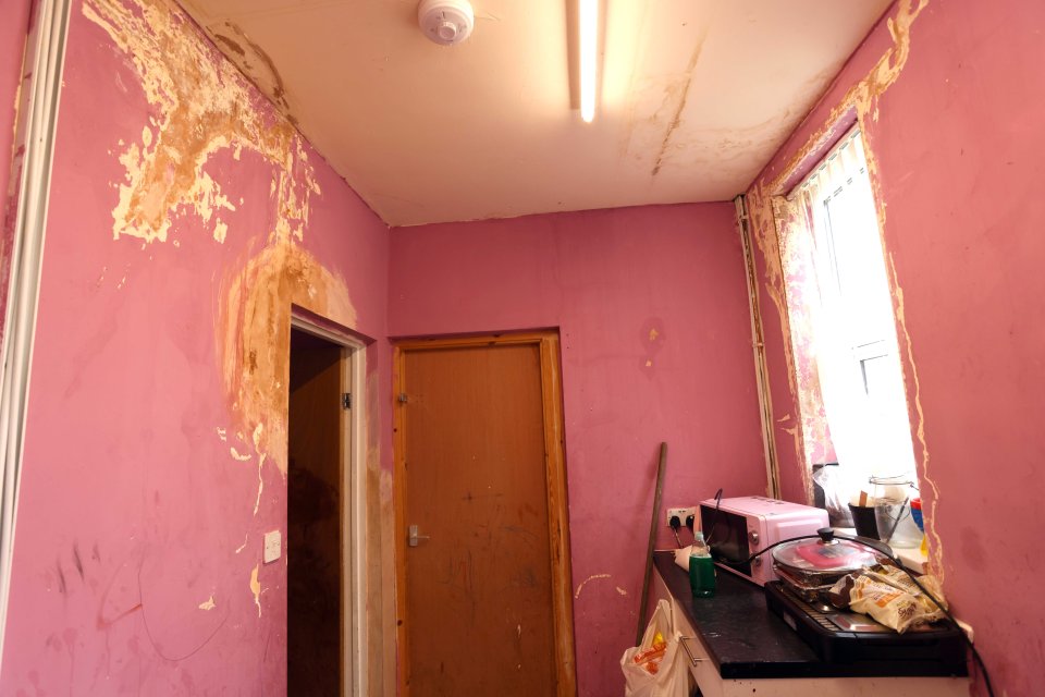 Inside the home of Joanne Edge, who only lives in the upstairs of the property to avoid  damp