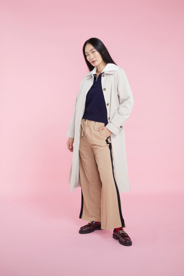 Trench coats work really well over the top of wide leg trousers, a half-zip knit and some loafers