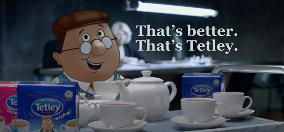 an advertisement for tetley tea shows a man holding a teapot