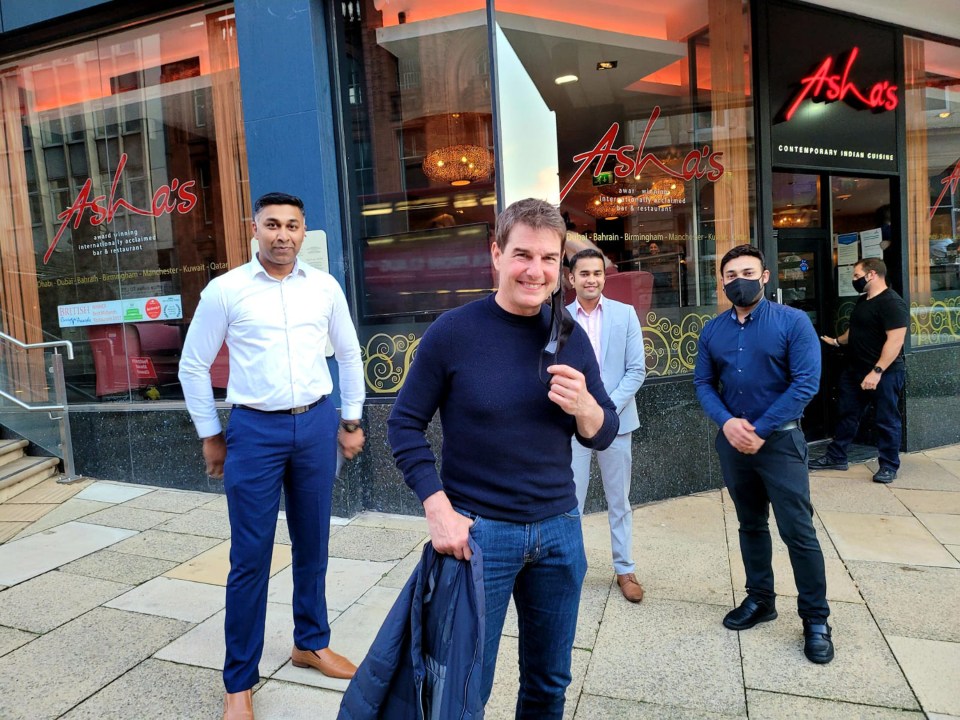 The movie star was spotted poses with staff at a curry house where the hungry star ordered two chicken tikka masalas