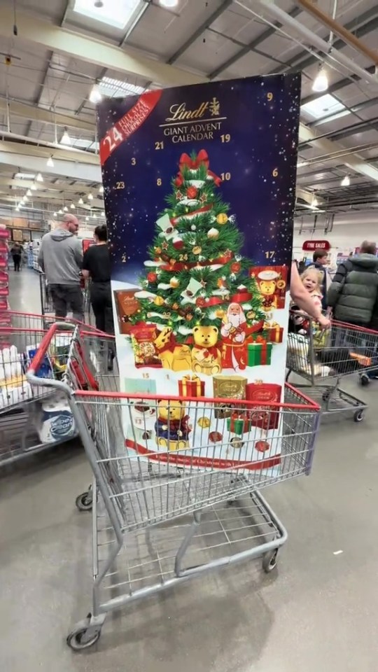 a lindt giant advent calendar is in a shopping cart