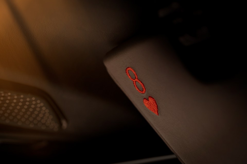 A subtle nod to Bond fans: the 'eight of hearts' is embroidered on the driver’s sun visor