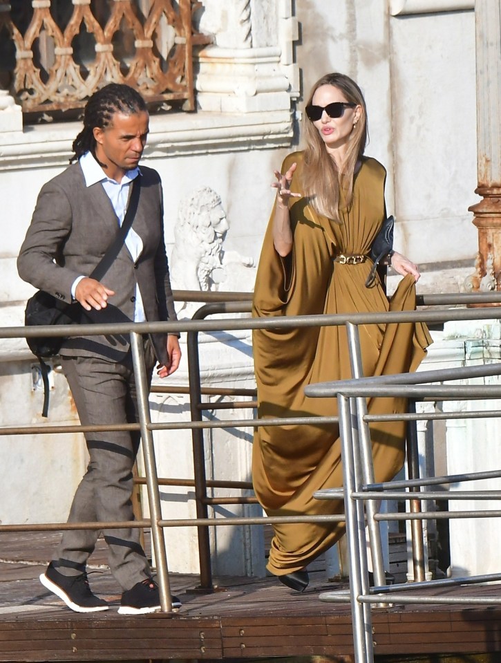 Actress Angelina Jolie has been on a string of secret dates in London as her romance with British hip-hop star Akala heats up - the pair are pictured here in Venice