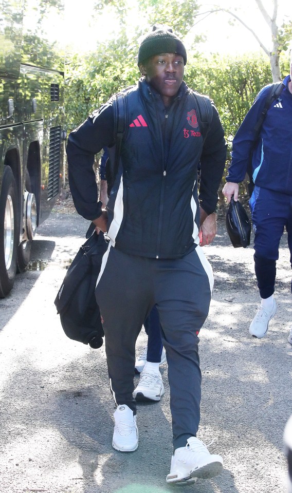 a man wearing a jacket with the word adidas on it