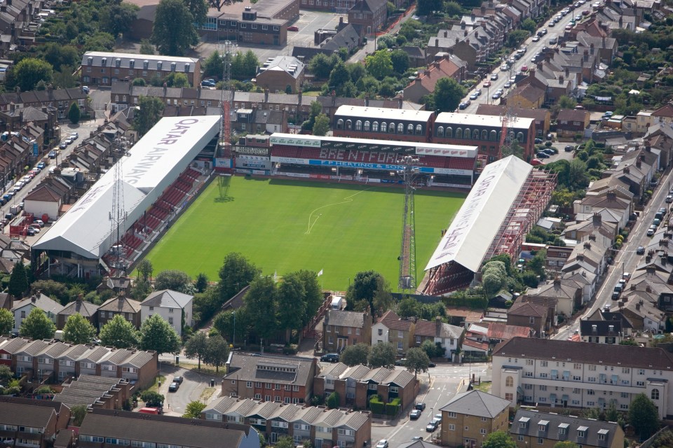 an aerial view of a soccer stadium sponsored by qatar airways