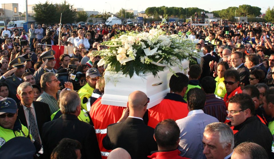 Thousands of mourners walked past Sarah's coffin after her murder shocked Italy