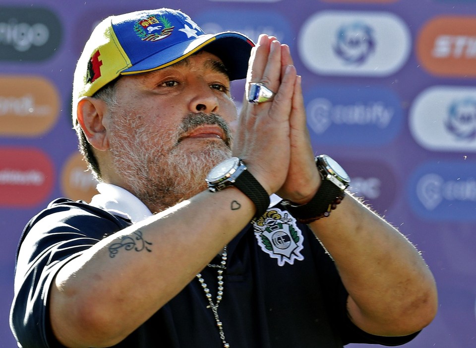 a man wearing a hat that says venezuela on it