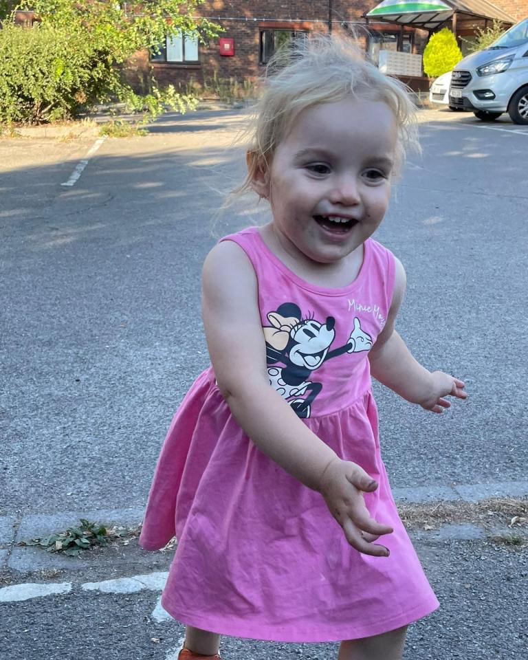 The two-year-old was found locked in a bathroom in her pushchair