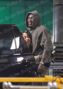  They were seen sharing a smiling embrace next to a car