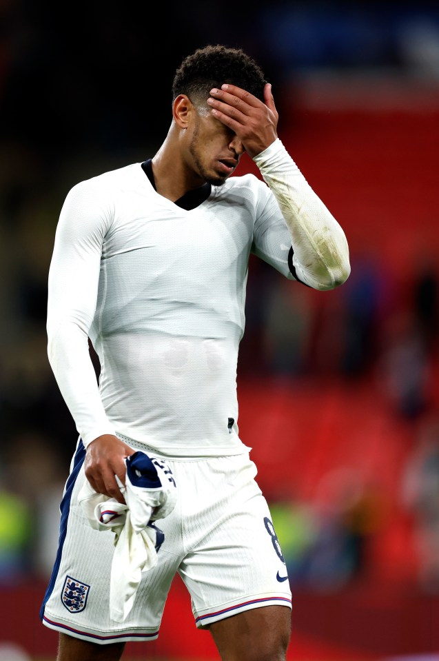 a soccer player with the number 8 on his shorts