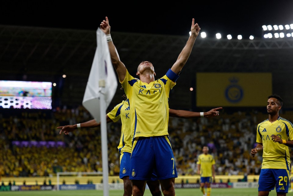 a soccer player in a yellow and blue kafd jersey