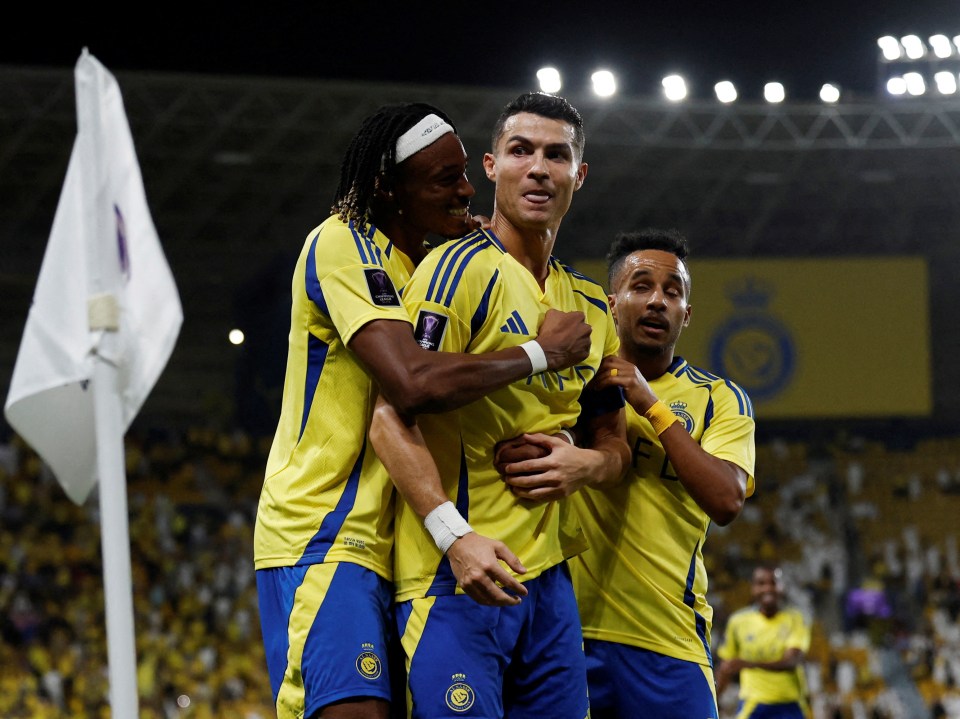 a group of soccer players wearing yellow and blue jerseys with the word adidas on them