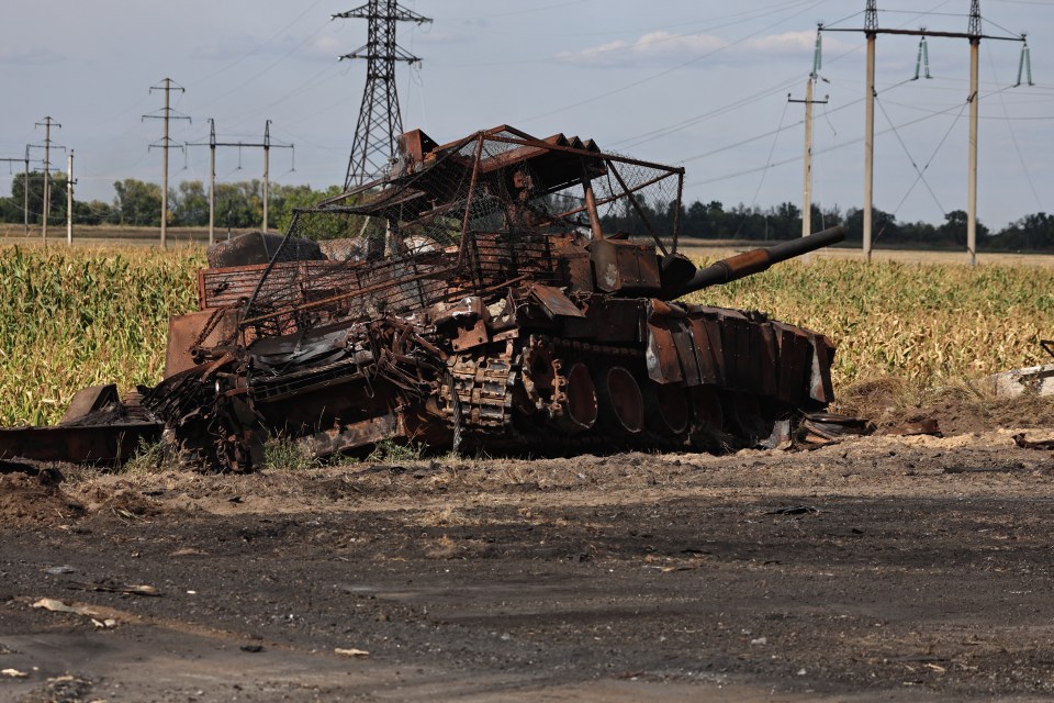 A destroyed Russian tank outside the Ukrainian-controlled Russian town of Sudzha in Kursk