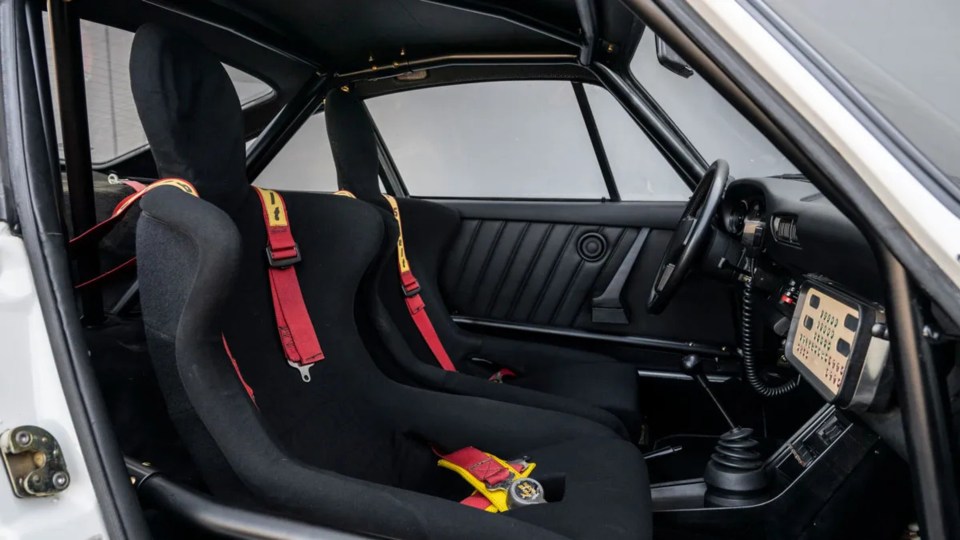 It’s fitted out with 935-style “lollypop” seats and a roll cage