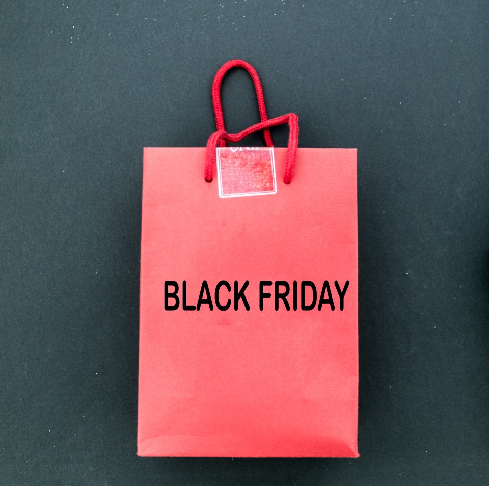 a red bag that says black friday on it