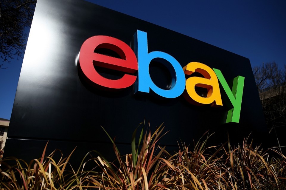 (FILE PHOTO) It has been announced that from 2015, PayPal will split from eBay Inc and become a separate publicly traded operation. SAN JOSE, CA - JANUARY 22: A sign is posted in front of the eBay headquarters on January 22, 2014 in San Jose, California. eBay Inc. will report fourth quarter earnings today after the closing bell. (Photo by Justin Sullivan/Getty Images)