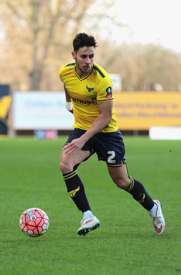 a soccer player with the number 2 on his shorts