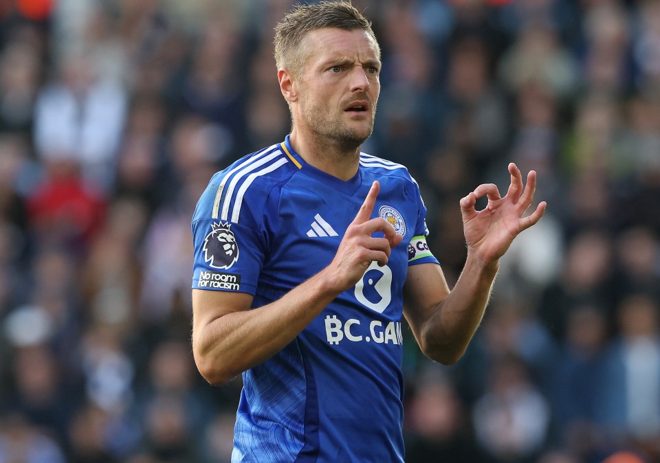 a soccer player wearing a blue jersey with the word bc on it