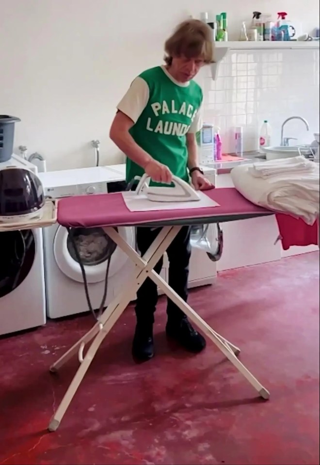 Sir Mick Jagger shows he’s got ironing to a tee as promotes his new clothing range