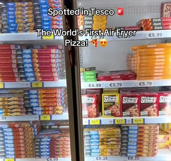 a fridge full of frozen pizzas with the words spotted in tesco the world 's first air fryer pizza