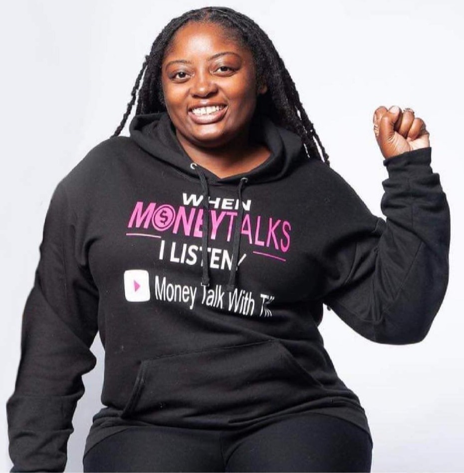 a woman wearing a black hoodie that says when money talks i listen