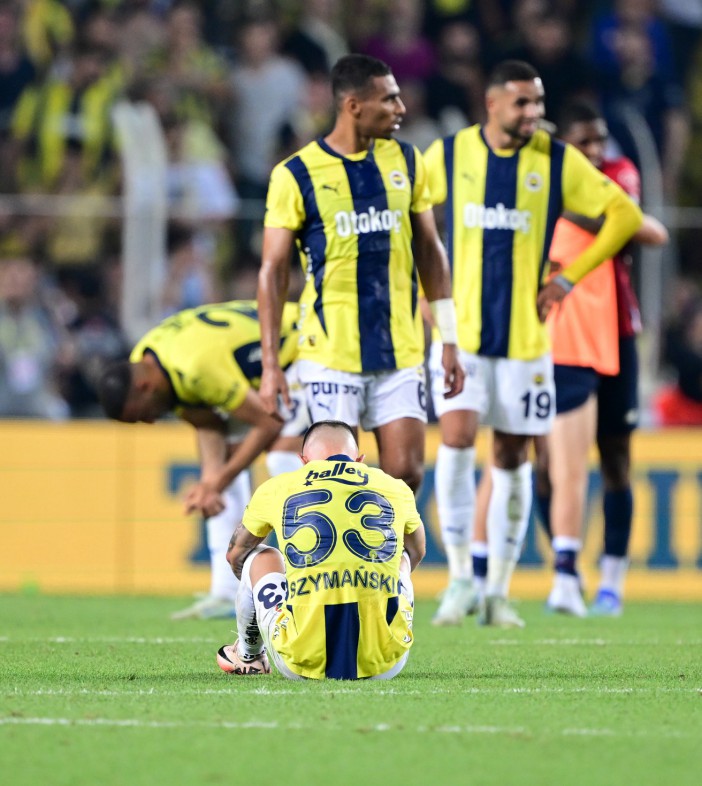 ISTANBUL, TURKIYE - AUGUST 13: Players of Fenerbahce look dejected as players of Lille celebrate their win at the end of the match, securing their place in the next stage of the competition after the UEFA Champions League third qualifying round second-leg match between Fenerbahce and Lille at Ulker Stadium in Istanbul, Turkiye on August 13, 2024. (Photo by Ali Atmaca/Anadolu via Getty Images)