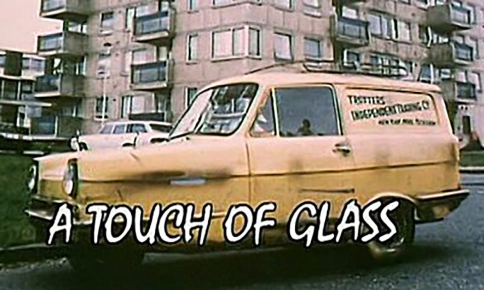 BNPS.co.uk (01202 558833) Pic: BBC/BNPS Pictured: The van on A Touch of Glass. Del Boy Trotter's classic three-wheeled van from Only Fools and Horses has emerged for sale for £18,000. The battered-looking yellow 1972 Reliant Regal Supervan III with 'Trotters Independent Trading Co' on the side appeared in the first two series of the beloved BBC 1980s sitcom. Four decades on, it is being sold with props from the show including a market suitcase, fluffy dice and an inflatable doll. The van, which has a top speed of 55mph and has done 97,000 miles, was acquired by the late BBC film producer John Mansfield after it was no longer needed for filming. It has since passed into the hands of a private collector who is selling it at Classic Car Auctions, of Ashorne, Warks. They say it belongs in the top echelon of British TV vehicles.