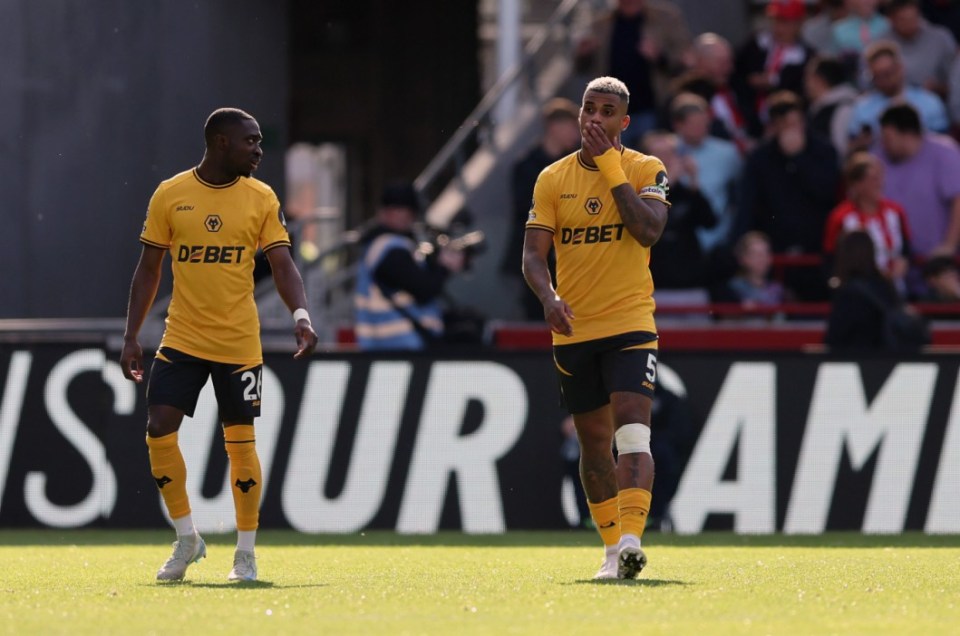 Mario Lemina appears dejected after Wolves concede against Brentford