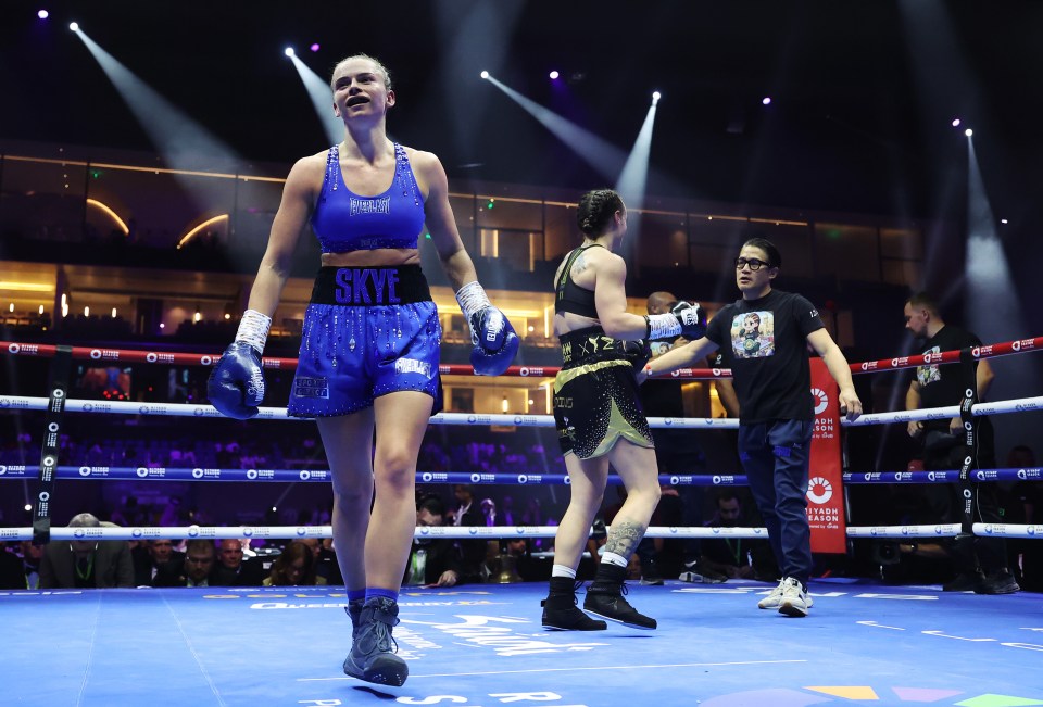 Skye Nicolson reacts after the Women's WBC World Featherweight title