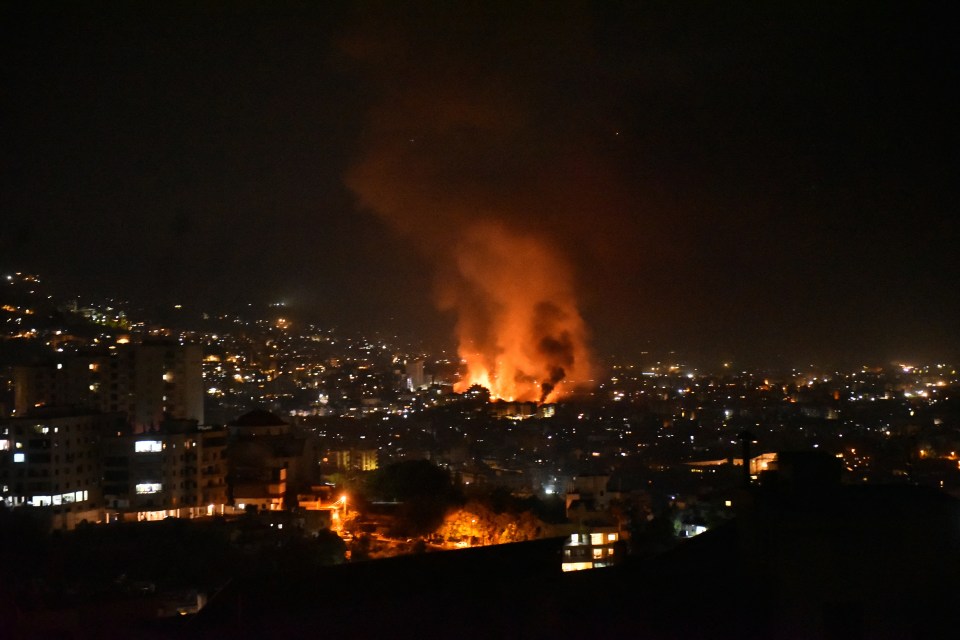 Smoke billows from the site of an airstrike after Iran bombards Israel with 181 missiles