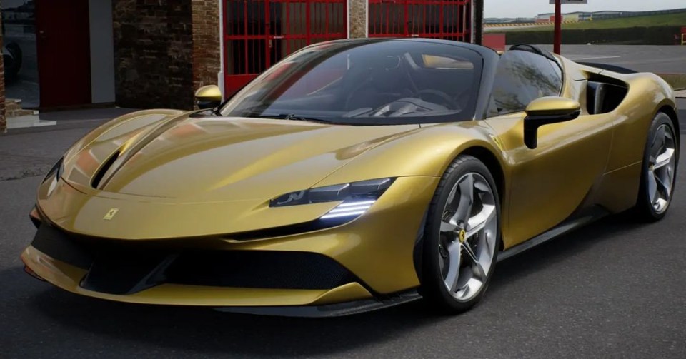 a ferrari sports car is parked in front of a brick building