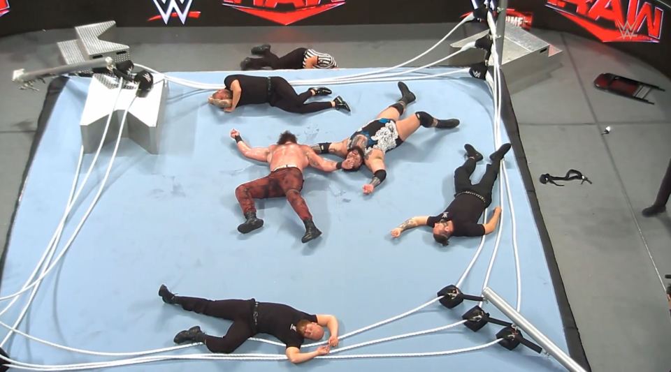 Bodies were strewn across the ring after the titanic slam