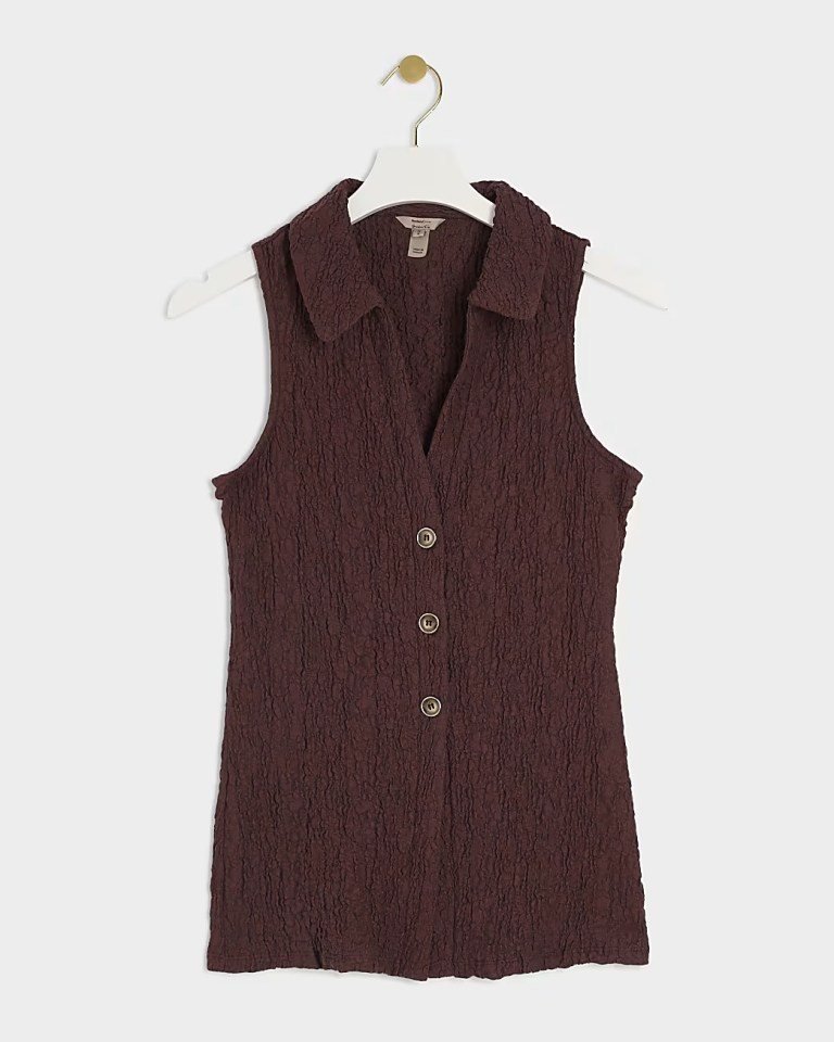 This sleeveless shirt is down from £32 to £12 at River Island