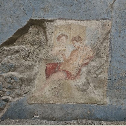 a painting of a man and woman on a wall