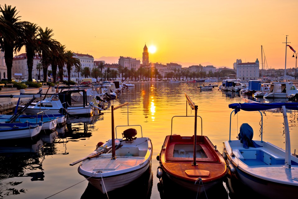 Watch the sunriseat the harbour in Split