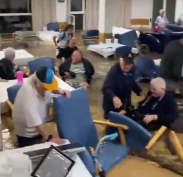 Residents of a care home moved to safety as water rose around them