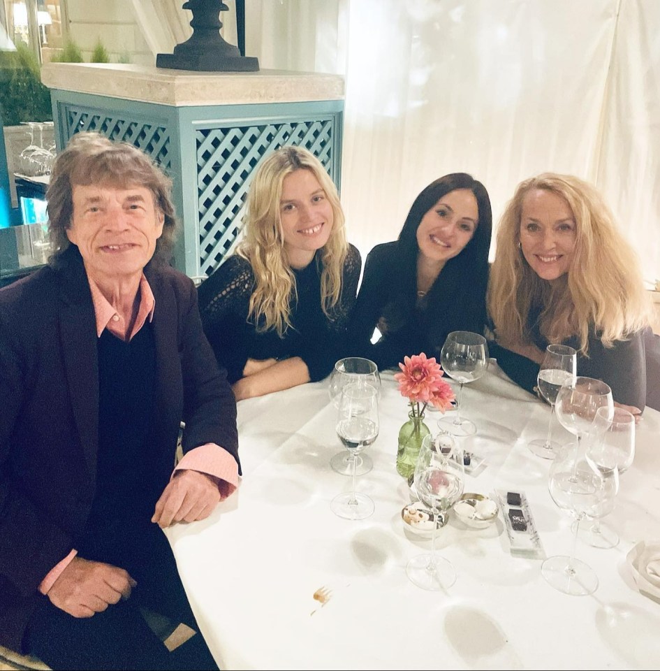 She is seen enjoying dinner with dad Mick Jagger, who is the grandfather to her son