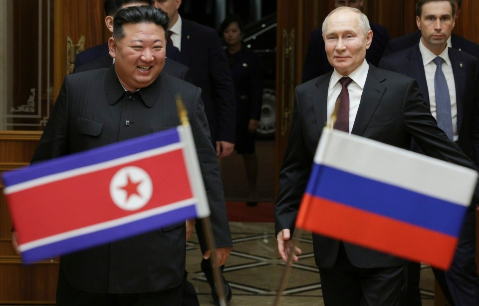 FILE - Russian President Vladimir Putin, right, and North Korea's leader Kim Jong Un smile during their meeting at the Pyongyang Sunan International Airport outside Pyongyang, North Korea, on June 19, 2024. (Gavriil Grigorov, Sputnik, Kremlin Pool Photo via AP, File)